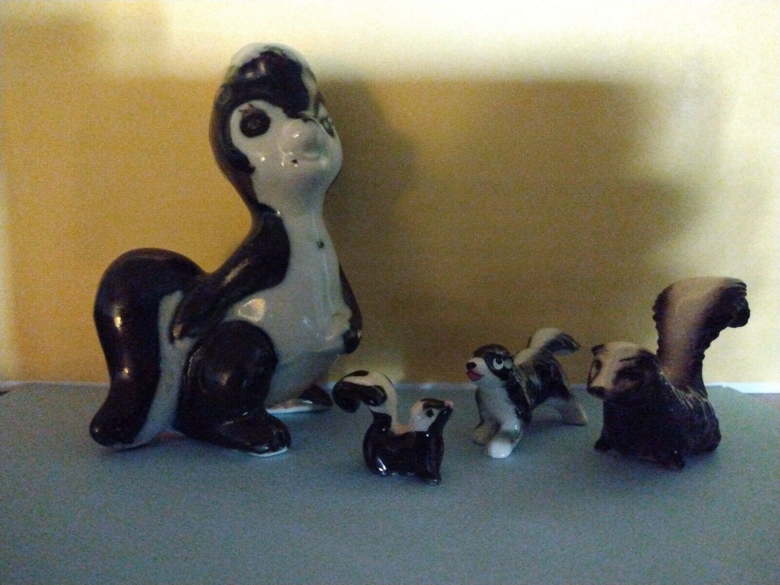 Vintage Skunk Family Figurines